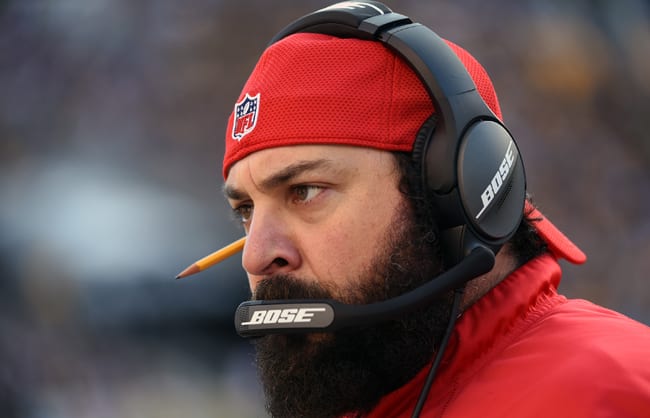 Patricia, with signature backward cap and pencil behind ear.